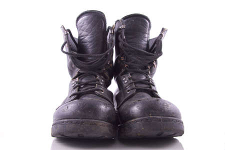 worn black amry boot isolated on whiteの写真素材