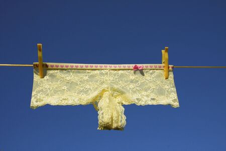 Clothes on washing laundry lineの写真素材