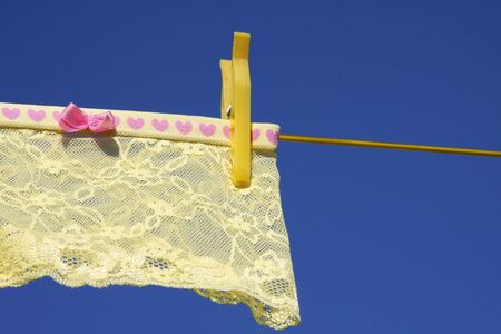 Clothes on washing laundry lineの写真素材