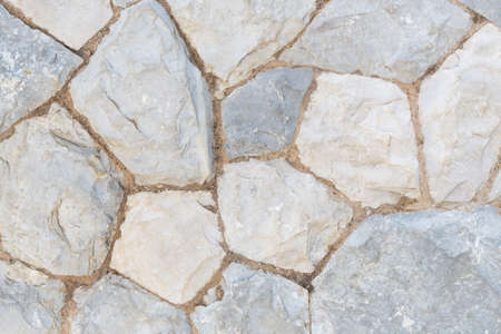 Stone wall background or texture