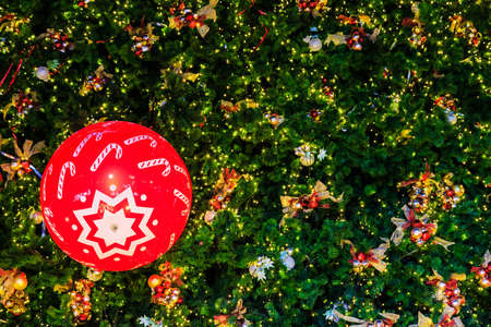 Red Ball on Glitter Christmas Treeの写真素材