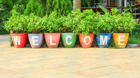 Welcome text sign on vivid multicolor potteryの写真素材
