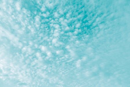 Vintage abstract summer background,  Turquoise color sky and moving white cloud