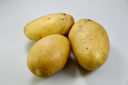 potatoes on the white backgroundsの写真素材