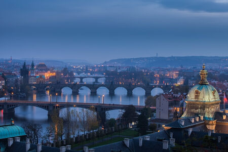 View of evening Prague from the high point, view of the bridge over the Vltava Riverの写真素材