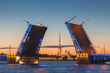 White nights in Saint-Petersburg - the opening of the Palace drawbridge, a view of the Peter and Paul Cathedralの写真素材