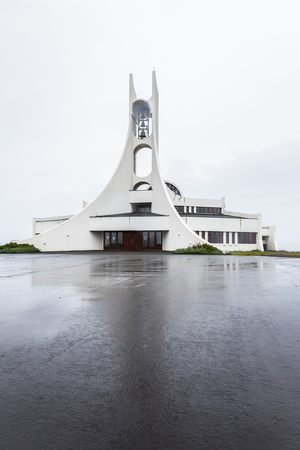 BORGARBRAUT, STYKKISHOLMUR, ICELAND -   JUNE 24, 2014: Church Stykkisholmskirkja was inaugurated 1990, designed by architect Jon Haraldsson. It is well known for its fine acoustics and musical eventsのeditorial素材