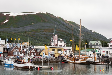HUSAVIK, ICELAND -   JUNE 22, 2014: Husavik is a town on the north coast of Iceland on the shores of Skjalfandi bay. The town is a center of whale watching in Icelandのeditorial素材