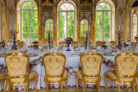 TSARSKOYE SELO PUSHKIN, RUSSIA - SEPTEMBER 28, 2012: Interior of Hermitage pavilion in the Catherine Park of Tsarskoye Selo with its famous dining mechanical table, Baroque styleのeditorial素材