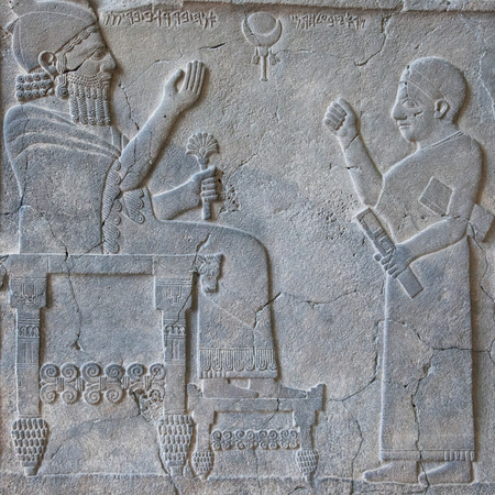 BERLIN, GERMANY - MARCH 06, 2013: Stone relief King Barrakib and his scribe in Near East Vorderasiatisches Museum. Museum has one of the world's largest collections of Southwest Asian artのeditorial素材