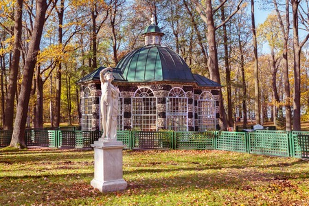 PETERHOF, SAINT PETERSBURG, RUSSIA - OCTOBER 09, 2016: Aviary Pavilion and sculpture in the Lower Gardens of Peterhof (suburb of St. Petersburg) in autumn.のeditorial素材