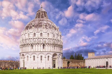 Pisa Baptistery of St. John in the Piazza dei Miracoli near the Duomo di Pisa, Tuscany, Italyの写真素材
