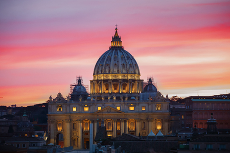 The Papal Basilica of St. Peter in the Vatican at sunset in the evening, Rome, Italyのeditorial素材