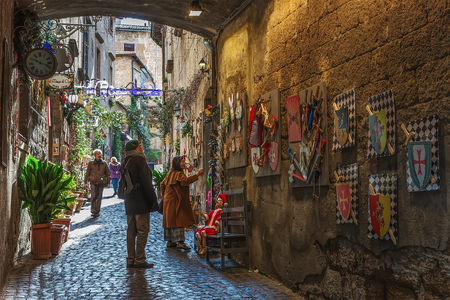 Orvieto, Italy â March 24, 2018:  Old street in the center of the city with ceramic souvenirsのeditorial素材