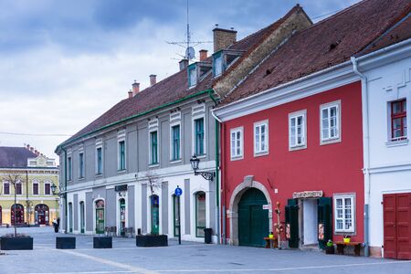 Eger, Hungary - March 07, 2019: Street with restaurants and shops in the center of Eger
