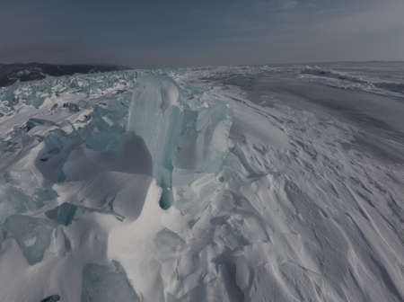 Ice hummocks on Lake Baikal near Olkhon Island on a sunny winter day. Siberia, Russiaの写真素材