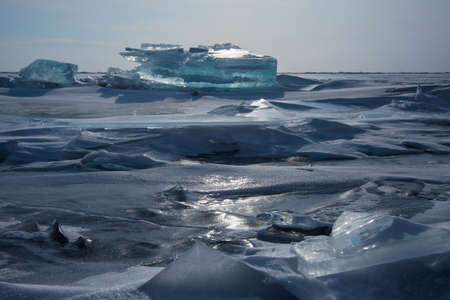 Background of icy snow hummocks, winter, Baikal, Siberiaの写真素材