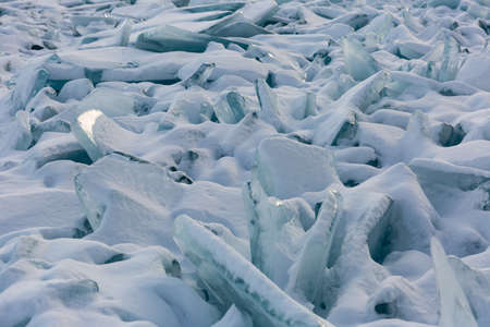 Background of icy snow hummocks, winter, Baikal, Siberiaの写真素材