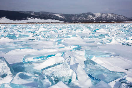 Background of icy snow hummocks, winter, Baikal, Siberiaの写真素材