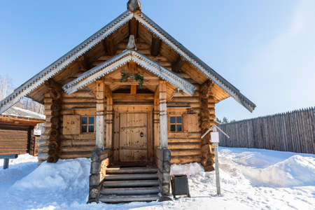 Russia, Irkutsk region - February 22, 2021: Architectural and ethnographic Museum Taltsy, near Lake Baikal, wooden houses of the Irkutsk region, Siberiaのeditorial素材