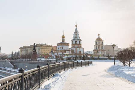 Russia, Irkutsk - February 21, 2021: View of the Cathedral of the Epiphany (1718 year of Foundation) and the monument to the founders of Irkutskのeditorial素材