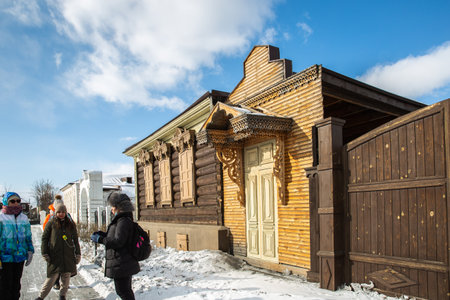 Russia, Ulan-Ude - February 27, 2021: Old wooden houses with carvings of Ulan-Udeのeditorial素材