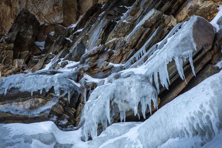 Icicles in the rocky caves. Winter at Lake Baikalの写真素材