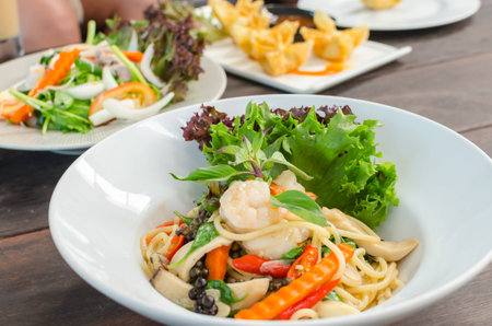 Seafood spicy stir-fried spaghetti, Drunken noodleの写真素材