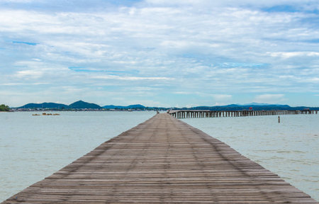 Wooden bridge into the seaの写真素材