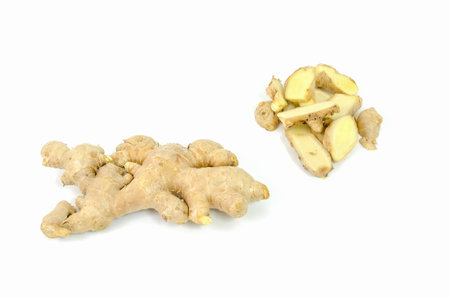 Fresh and sliced ginger root isolated on white backgroundの写真素材