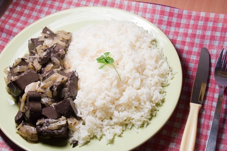 chicken blood cooked with onions and riceの写真素材
