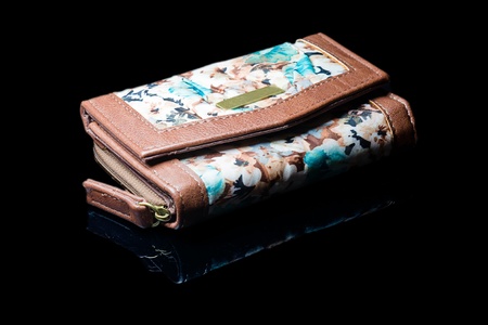 woman's purse on black backgroundの写真素材