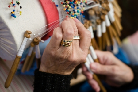 old woman sewingの写真素材
