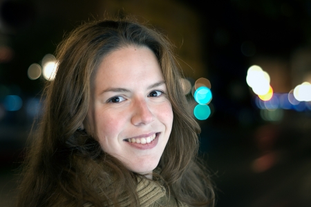 young woman at night bokehの写真素材