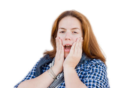 Portrait of a young woman with a surprised expressionの写真素材