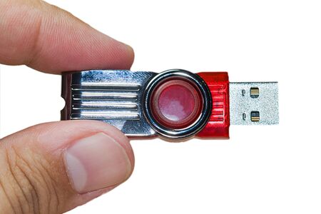 man holding a red pendriveの写真素材