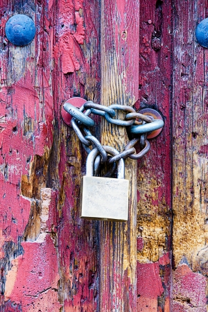 padlock in an old doorの写真素材