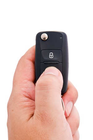 Man hand holding a garage door remote control の写真素材