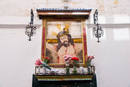 Jesus mosaic on the wall at street in Cadiz in Andalucia, Spain