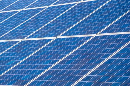 solar panels collecting energy from the sun の写真素材