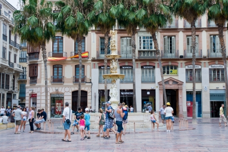 MALAGA, SPAIN - JULY 07: Tourists walk around the historic center of Malaga on July 07, 2012 in Malaga, Spain. It is the second most populous city of Andalusia and the sixth largest in Spain. のeditorial素材