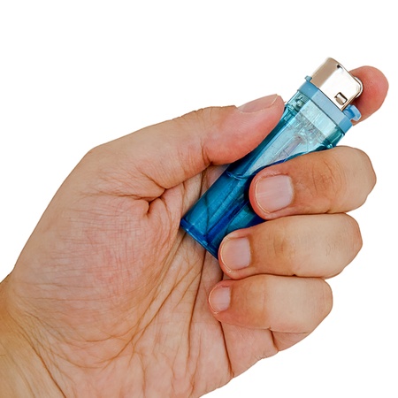 man holding a lighterの写真素材