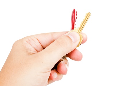 hand with colored keysの写真素材