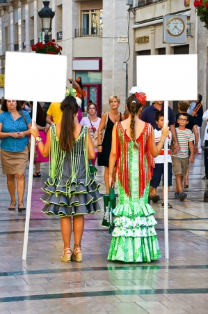 women in Malaga in fair, Spain. Larios street view.のeditorial素材