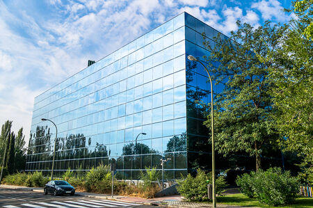 MADRID - SEPTEMBER 08: glass office building in Barajas, next to Juan Carlos I Garden, on September 08, 2013 in Madrid, Spain. のeditorial素材
