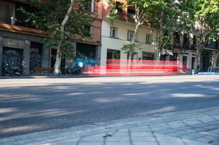 MADRID - SEPTEMBER 08: traffic in Cuesta San Vicente street next to Sabatini Gardens - Royal Palace gardens, on September 08, 2013 in Madrid, Spain. のeditorial素材