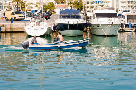 BENALMADENA, SPAIN - APRIL 09: A view of Puerto Marina on April 09, 2012 in Benalmadena, Malaga, Spain. This marina has berths for 1100 boats. It was opened on 1987. のeditorial素材