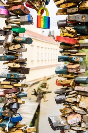 PRAGUE, CZECH REPUBLIC - SEPTEMBER 24: padlocks on fence in Kampa on September 24, 2013 in Prague, Czech Republic. It's a symbol of everlasting love.のeditorial素材