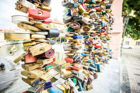 PRAGUE, CZECH REPUBLIC - SEPTEMBER 24: padlocks on fence in Kampa on September 24, 2013 in Prague, Czech Republic. It's a symbol of everlasting love.のeditorial素材