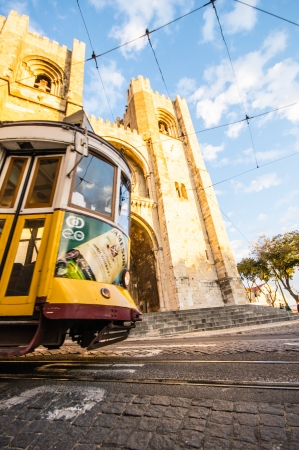 LISBOA, PORTUGAL - NOVEMBER 28: Traditional yellow tram/funicular on November 28, 2013 in Lisbon, Portugal. Carris is a public transportation company operates Lisbon's buses, trams, and funiculars.のeditorial素材